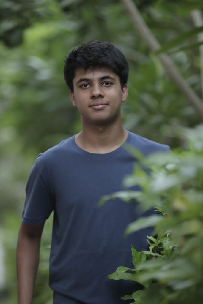 VIhaan Agarwal surrounded by trees