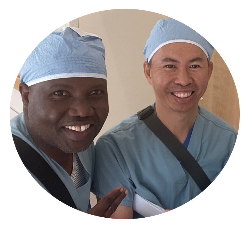 A visiting scholar and Stanford physician smile for the camera