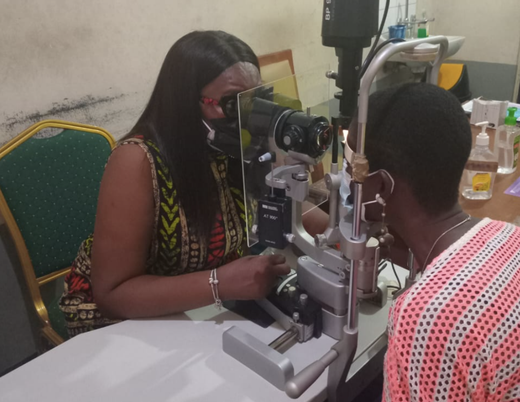 Yewande Babalola examines an ocular TB patient in Nigeria