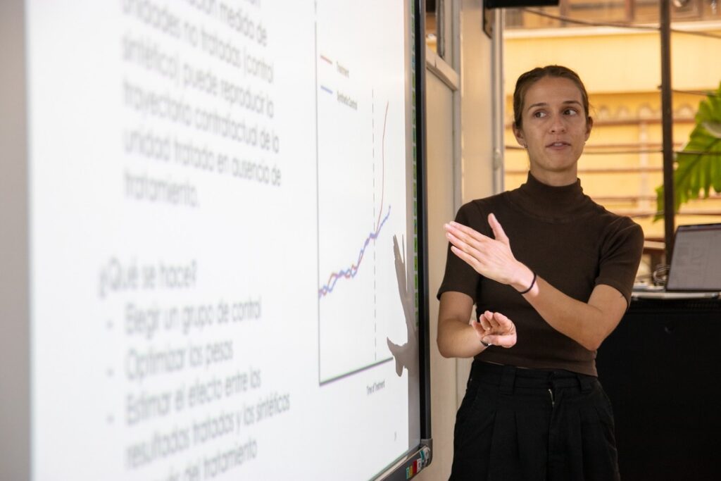 Aly Singleton presents research finding about road construction and Dengue to health officials in Peru. Courtesy of Aly Singleton.