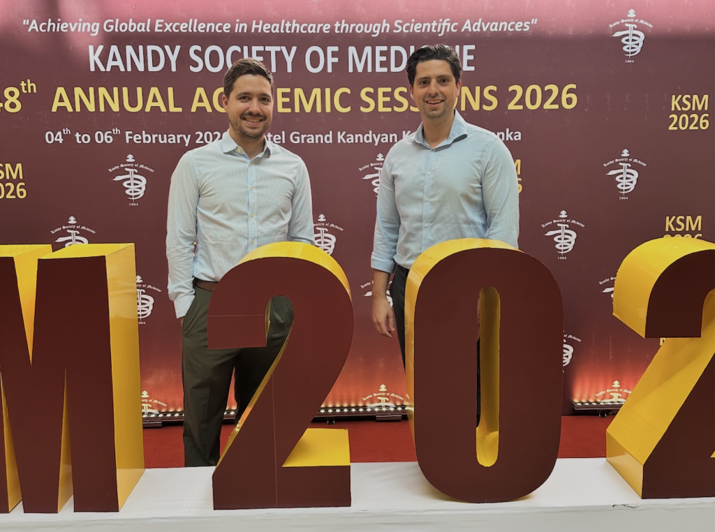 Medical residents Shyon Parsa, right, and Eduardo Guerrero, left, attend a medical society conference during their time in sri Lanka