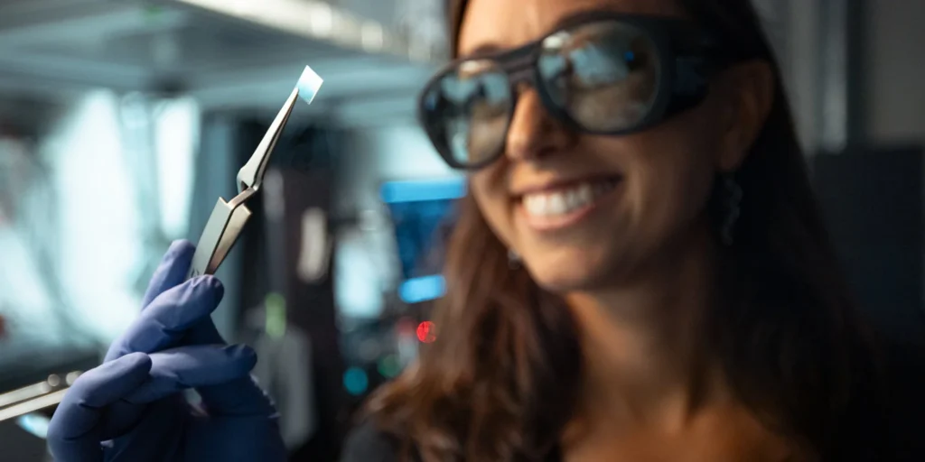 Halleh Balch from the School of Engineering holds up a prototype of an optical sensor she's designing in collaboration with marine scientists at the Center for Ocean Solutions and stakeholders in Palau. (Image credit: Andrew Brodhead)