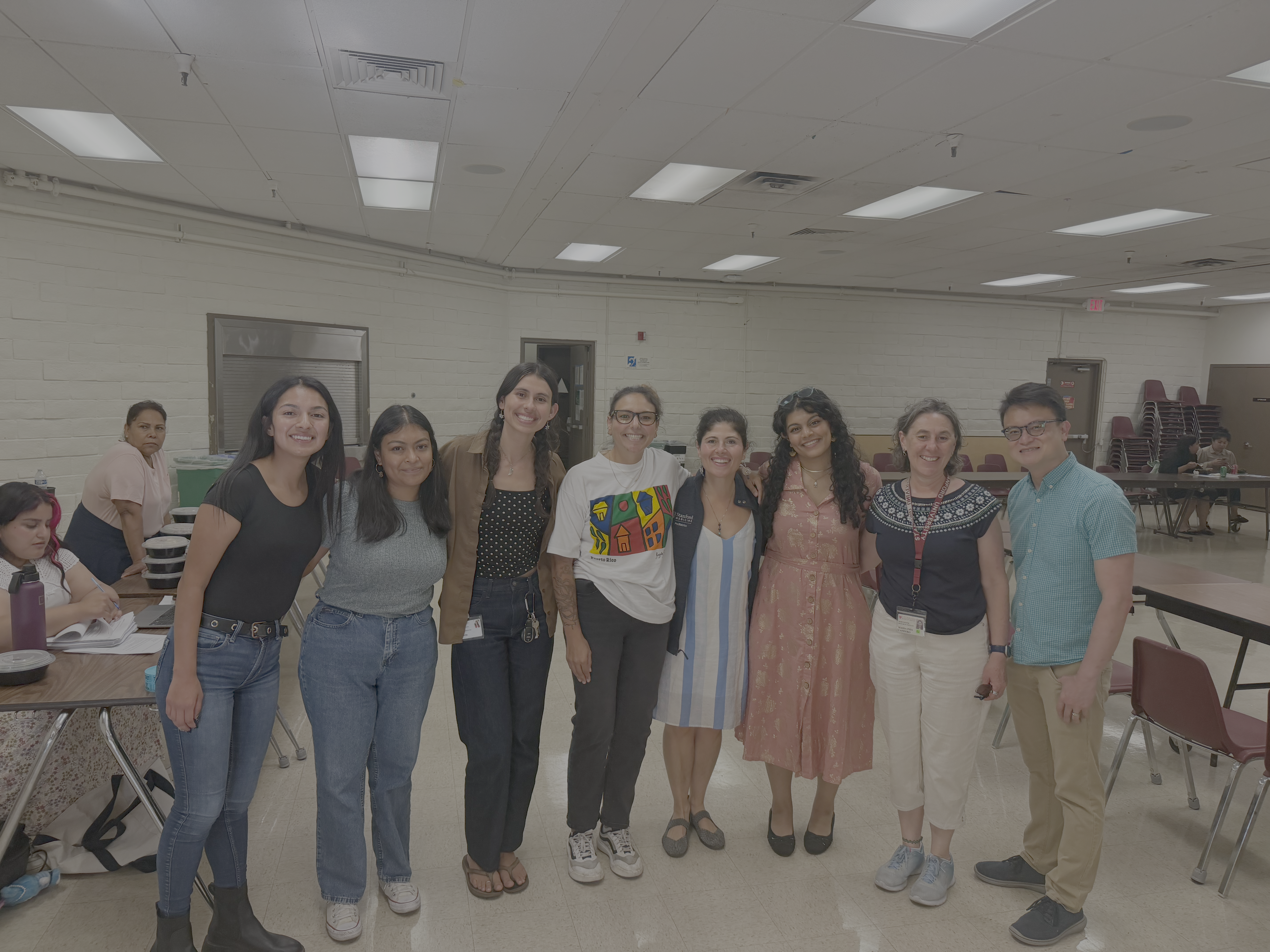 Desiree Labeaud and Sheila Krishnan gather with their research team as they engage communities in North Fair Oaks in San Mateo County to help them understand and protect themselves from the growing threat of mosquto-borne diseases. LaBeaud is fourth from left, Krishnan third from left. 